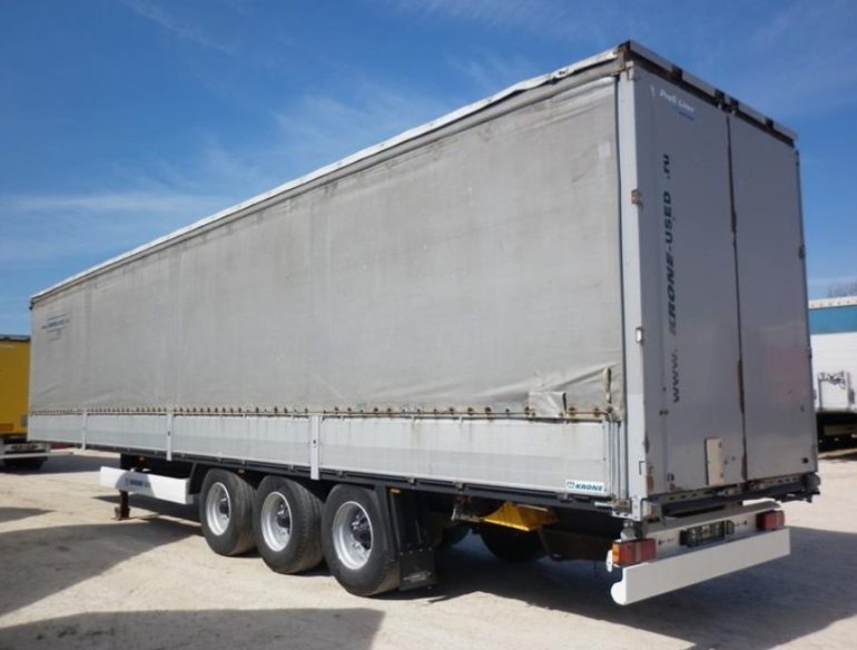 Шторно-бортовые полуприцепы бу для строительных грузов: плюсы и ограничения